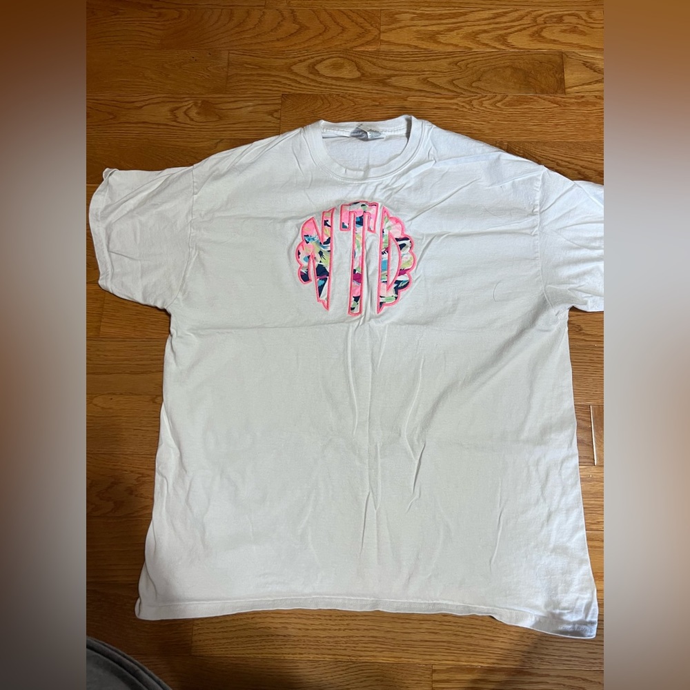 White T-shirt with initials ‘nTd’